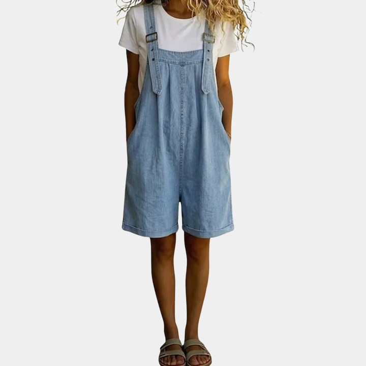 Clara | Short denim overall in light blue with a vintage washed finish