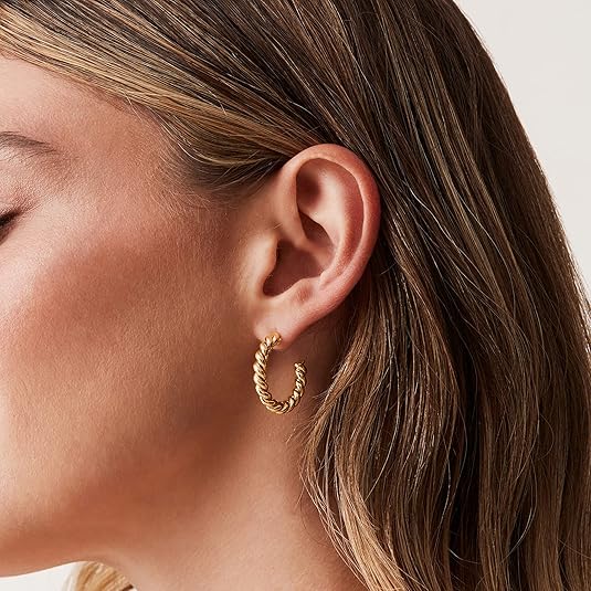 Twisted hoop earrings | Gold