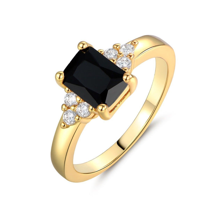 Ring with a black spinel in a baguette cut